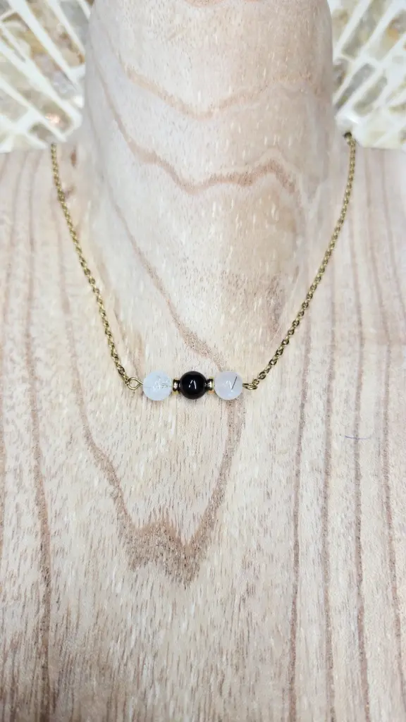 COLLIER TERELIA DORE CRISTAL DE ROCHE TOURMALINE, ONYX, CRISTAL DE ROCHE CRAQUELEE A